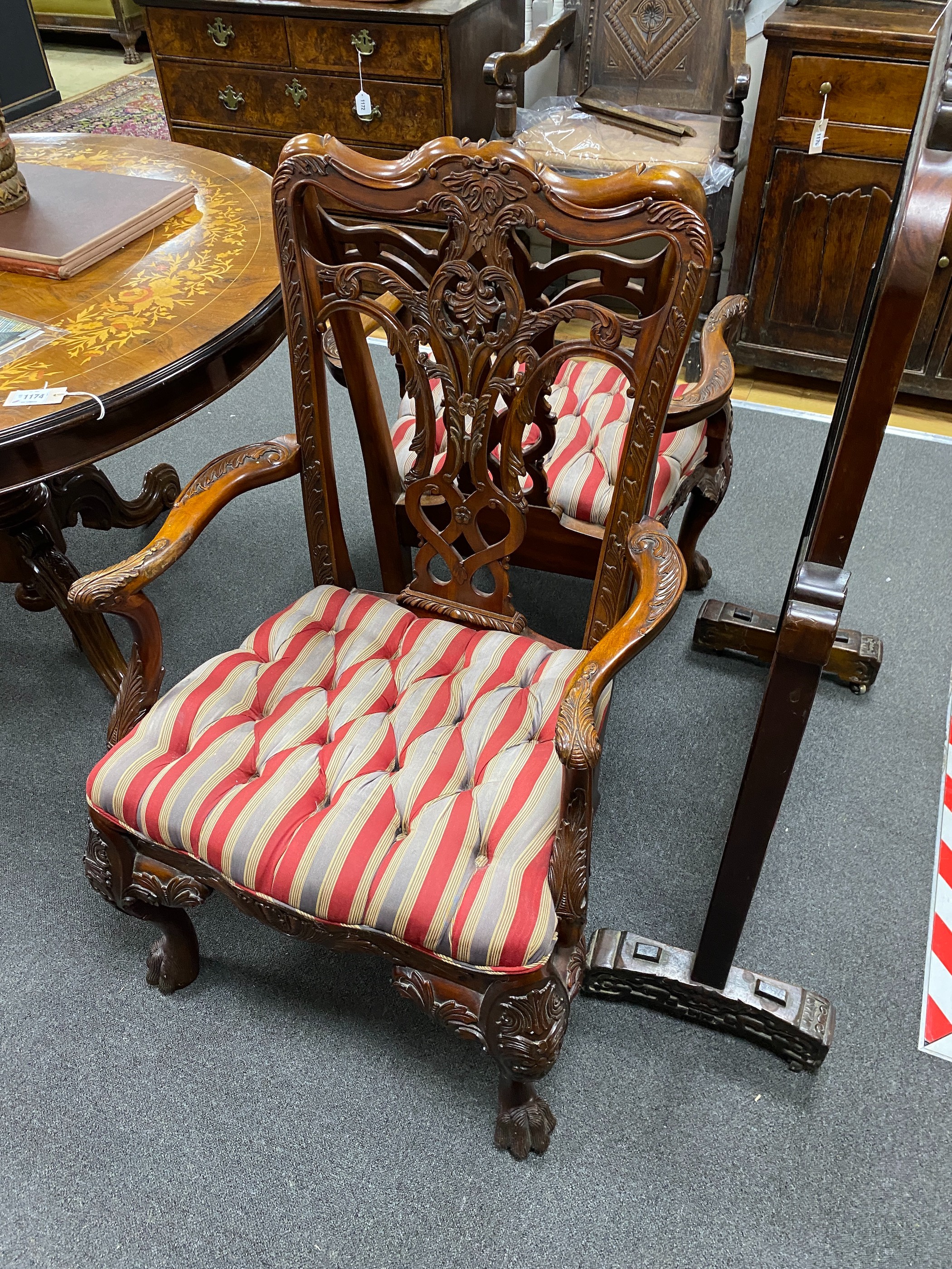 A pair of George III style mahogany elbow chairs, width 65cm, depth 50cm, height 106cm